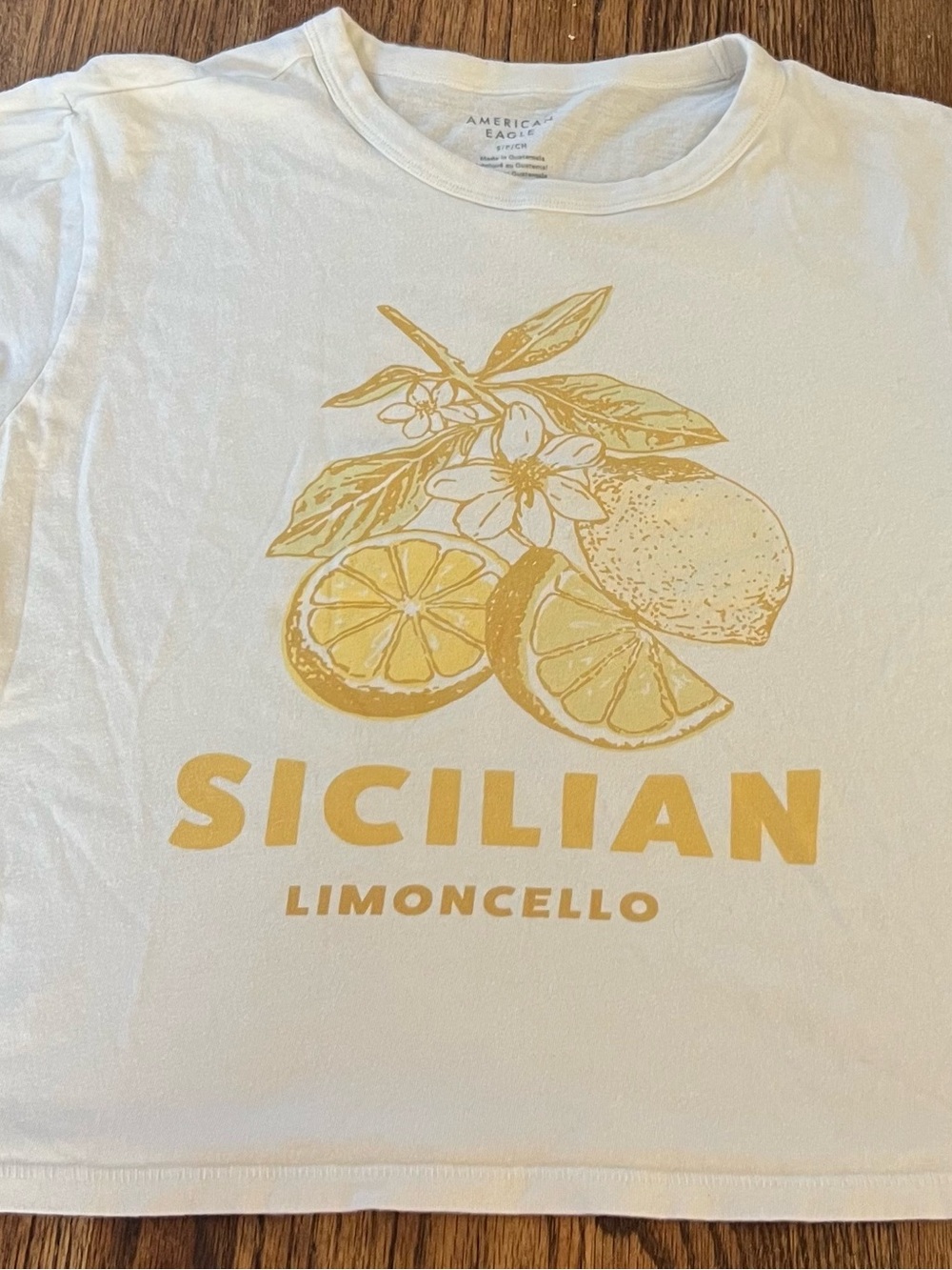 American Eagle Outfitters White Tee with Yellow Lemon Graphic